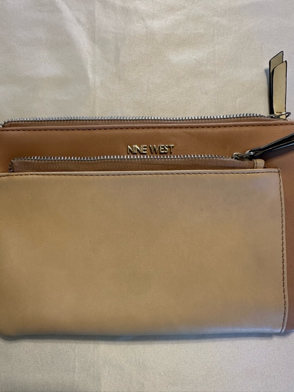 Nine West Tan and Light Brown Double Zip woman’s wristlet/ pocket book